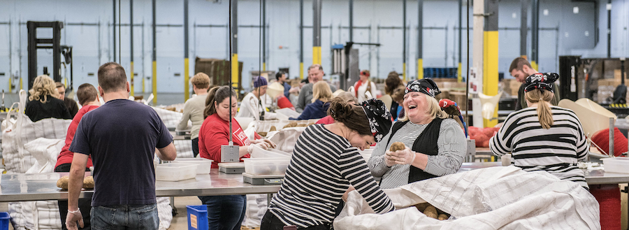 Photo of volunteers working at Minnesota-based Second Harvest Heartland. Photo of volunteers working at Minnesota-based Second Harvest Heartland.